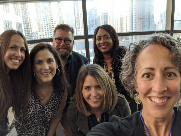 Group of six people posing for a selfie at the AJCU Leadership Institute conference in Chicago.