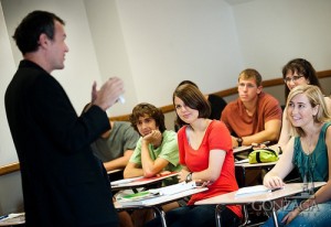 Father Maher teaching students