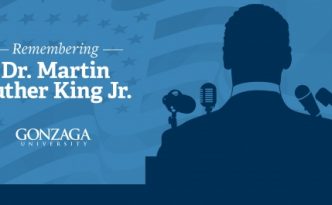 Remembering Dr. Martin Luther King Jr. with a silhouette of Marting Luther King Jr.