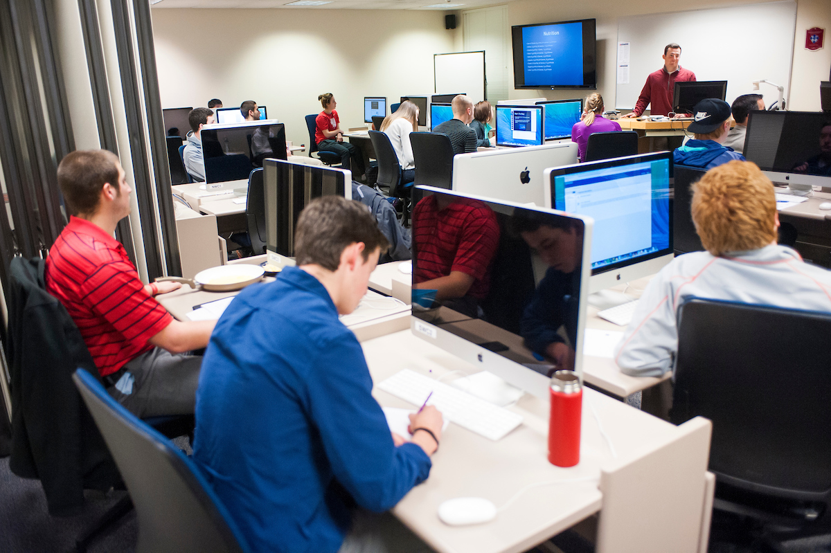 Students in "Sport and Fitness in the Digital Age" present "how to" presentations in the Rosaur Computer Lab to build oral communication skills on 3/1/16.