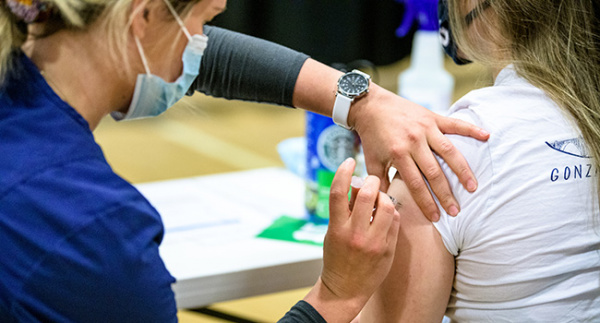 A student receives their first dose of the Coronavirus Vaccine at an on-campus Student Vaccine Clinic